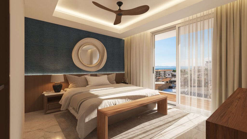 Modern bedroom in a Romantic Zone condo with ocean and city view from large window